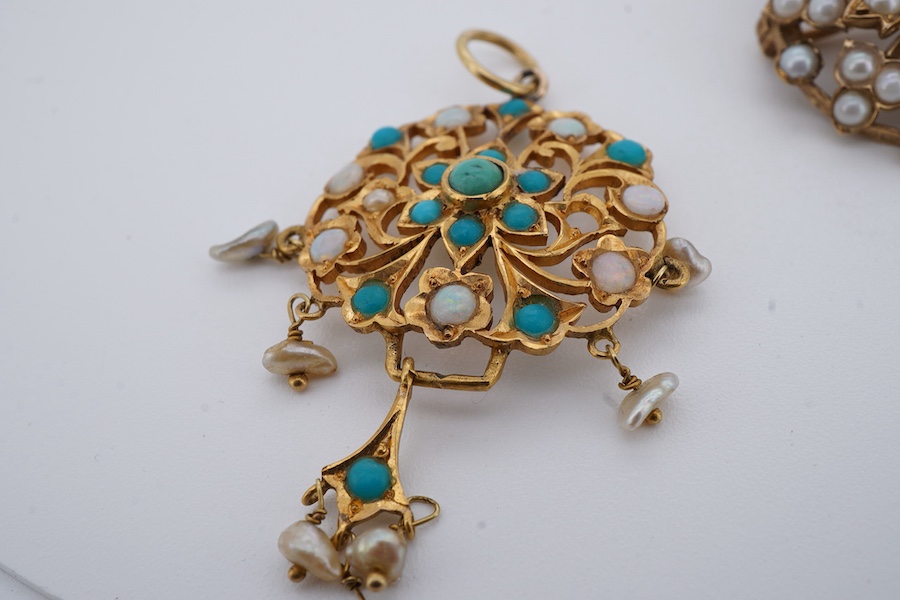 Two brooches and a pendant, each of floral design, the brooches set with circular-cut garnets, and seed pearls respectively each mounted in 9ct gold, British hallmarks, combined gross weight 11 grams, the pendant set wit